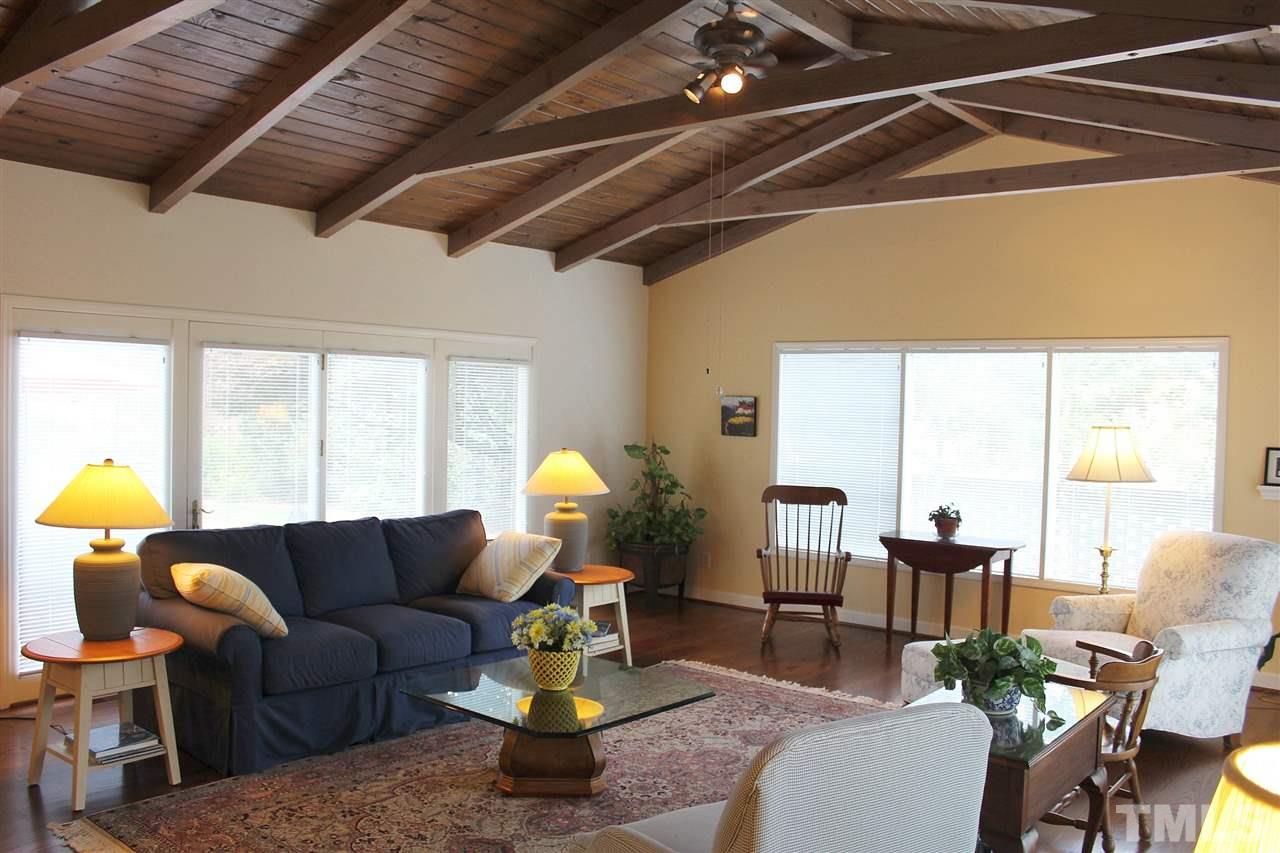 1502 Rogers Road Graham, NC 27253 - Photo 9 of 25 There is a vaulted ceiling in the sun room which also opens to pool deck and yard.
