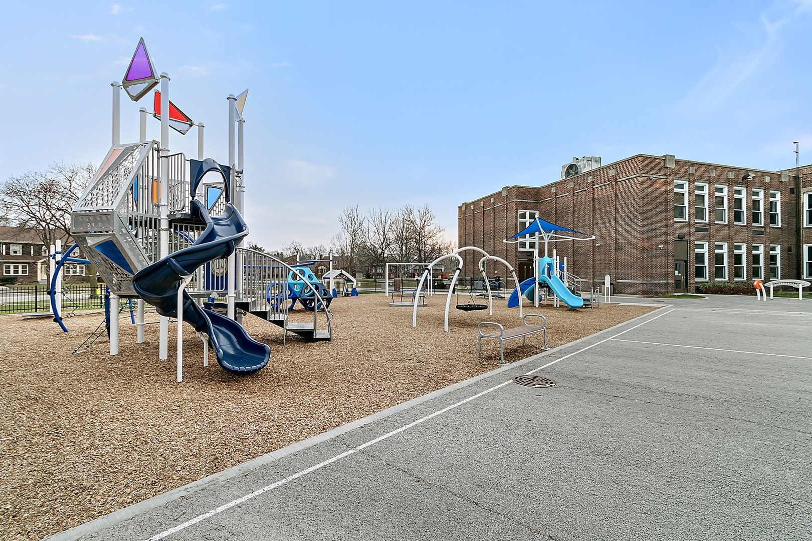 416 Loudon Road Riverside, IL 60546 - Photo 36 of 36 a view of a park with swings and slides