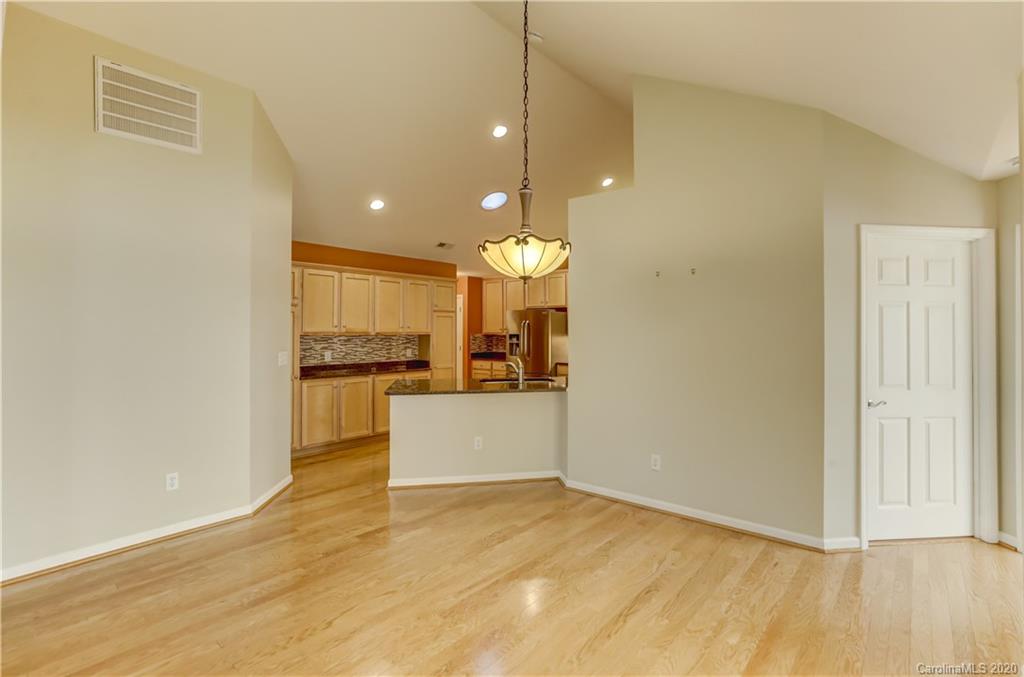 830 Ledgestone Court Tega Cay, SC 29708 - Photo 28 of 47 a view of a kitchen and a refrigerator