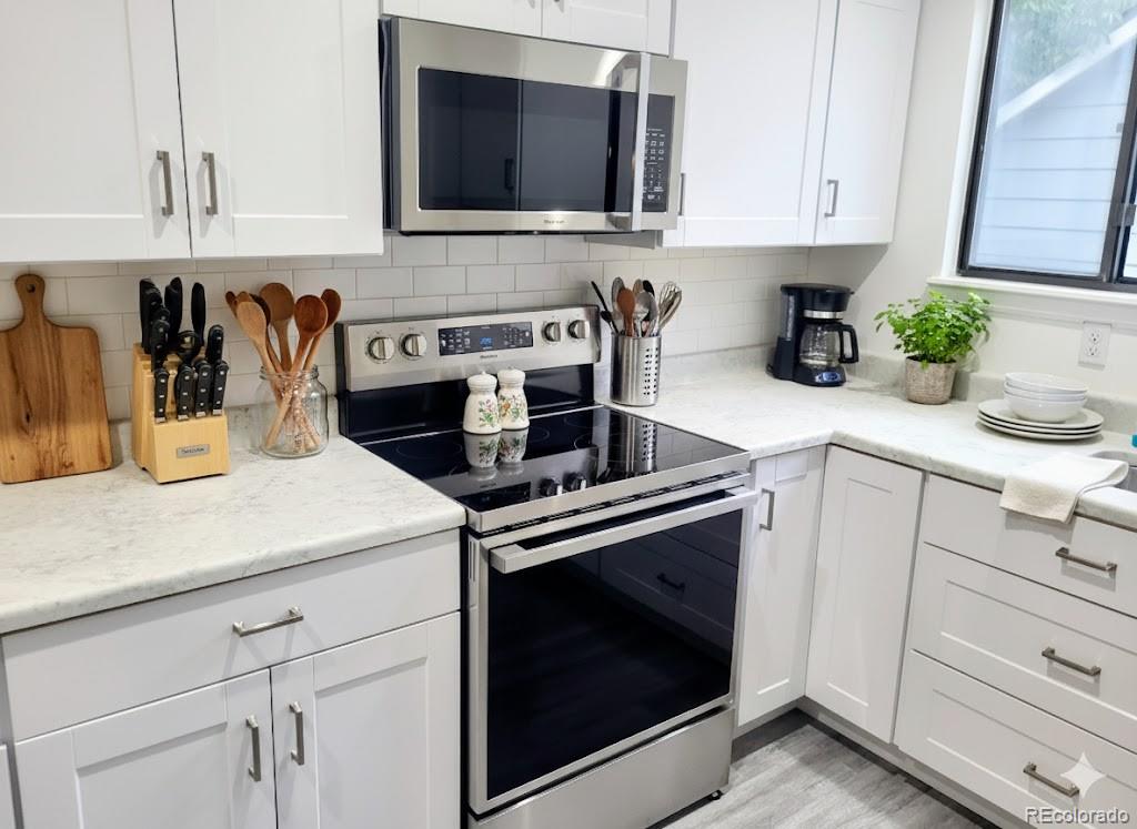 1475 South Quebec Way, Unit J48 Denver, CO 80231 - Photo 4 of 17