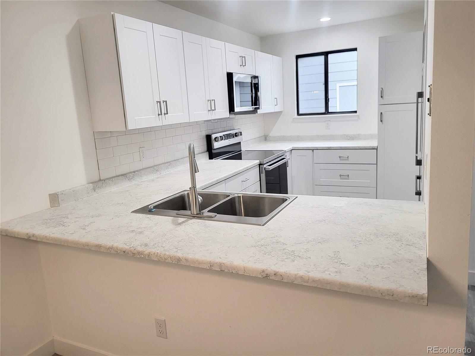 1475 South Quebec Way, Unit J48 Denver, CO 80231 - Photo 5 of 17