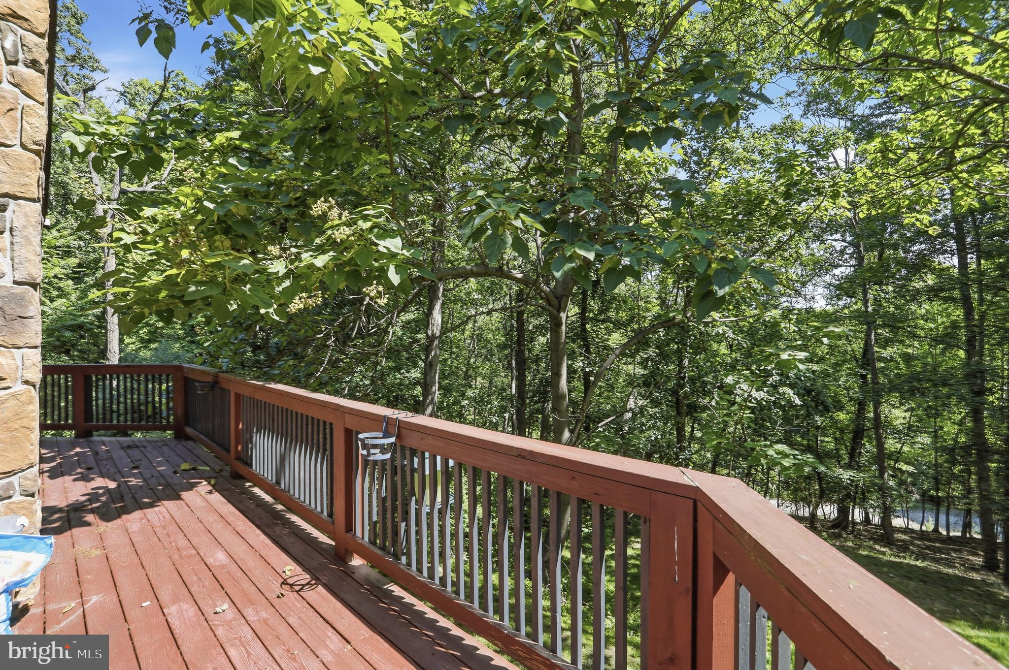 1400 Core Road Romney, WV 26757 - Photo 49 of 73 a balcony with wooden floor and yard in the back