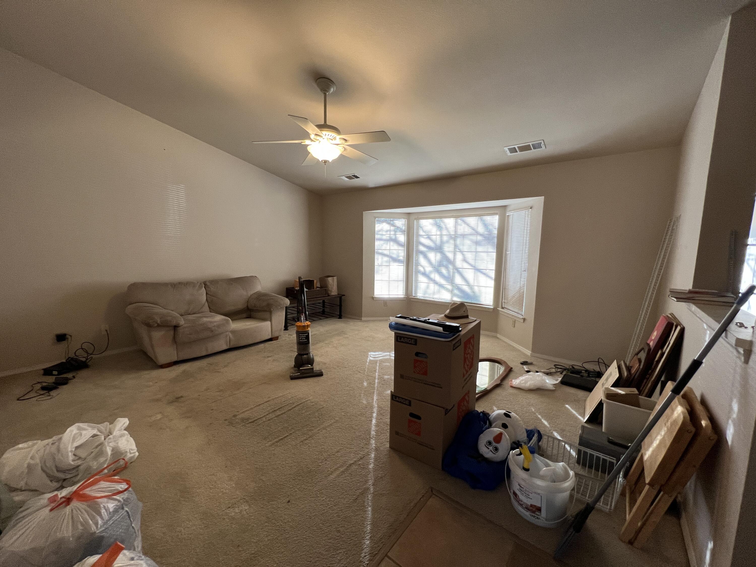1459 Hominy Way Redding, CA 96003 - Photo 3 of 10 a living room with furniture and a flat screen tv