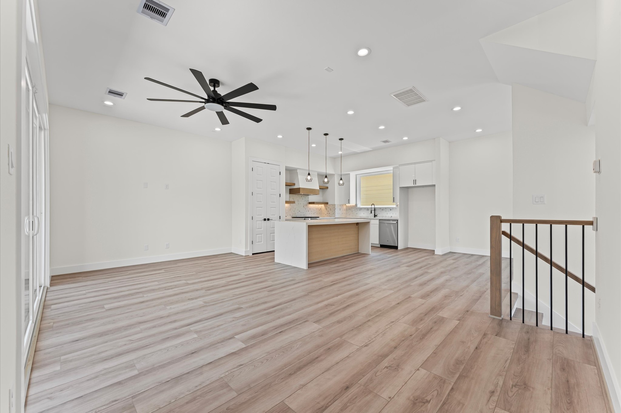 4104 Alice Street Houston, TX 77021 - Photo 16 of 28 a view of kitchen with wooden floor electronic appliances and window