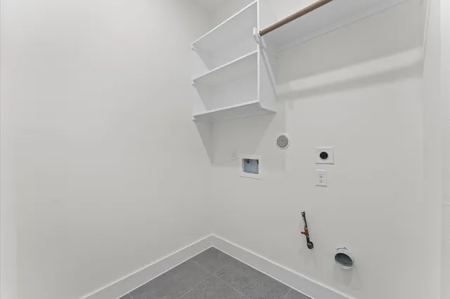 a bathroom with a bathtub shower sink vanity and toilet