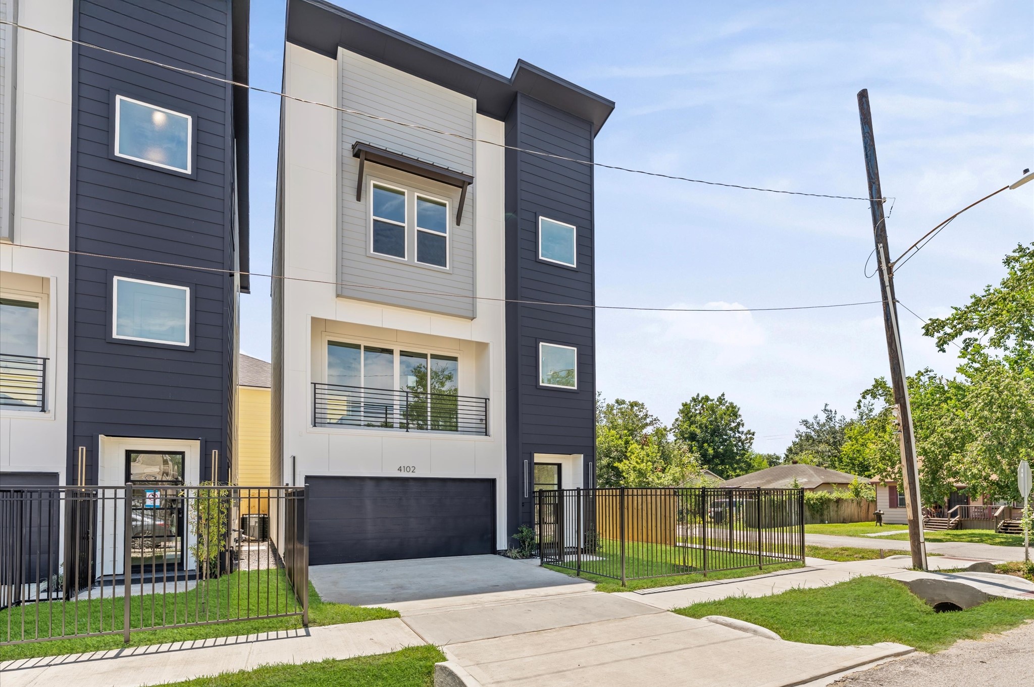 4104 Alice Street Houston, TX 77021 - Photo 3 of 28 a front view of a house with a garden and plants