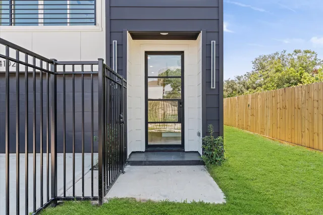 a view of backyard with a garden and stairs