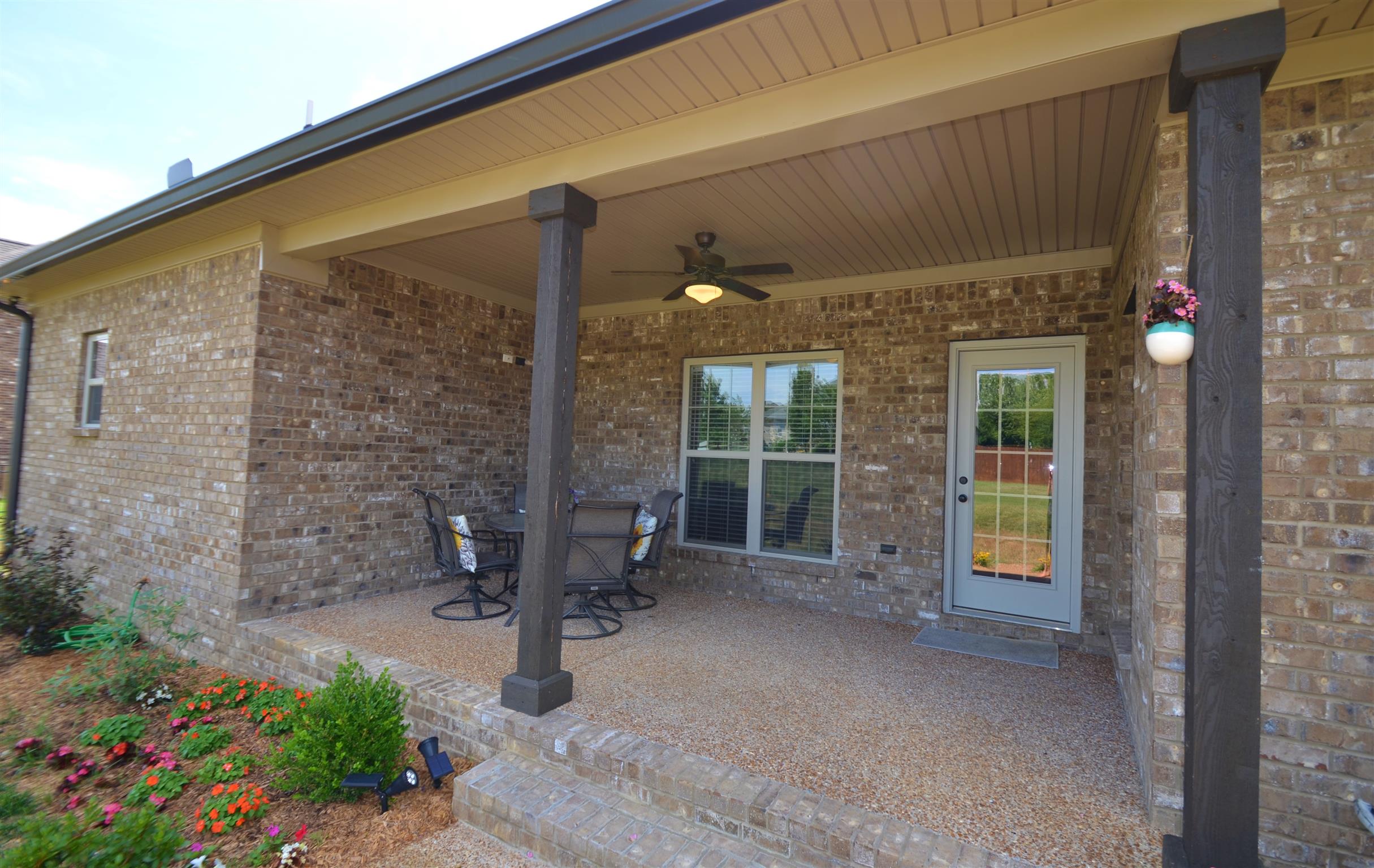 202 Monroe Way Lebanon, TN 37087 - Photo 20 of 26 Enjoy the outside all year while relaxing on the covered back porch