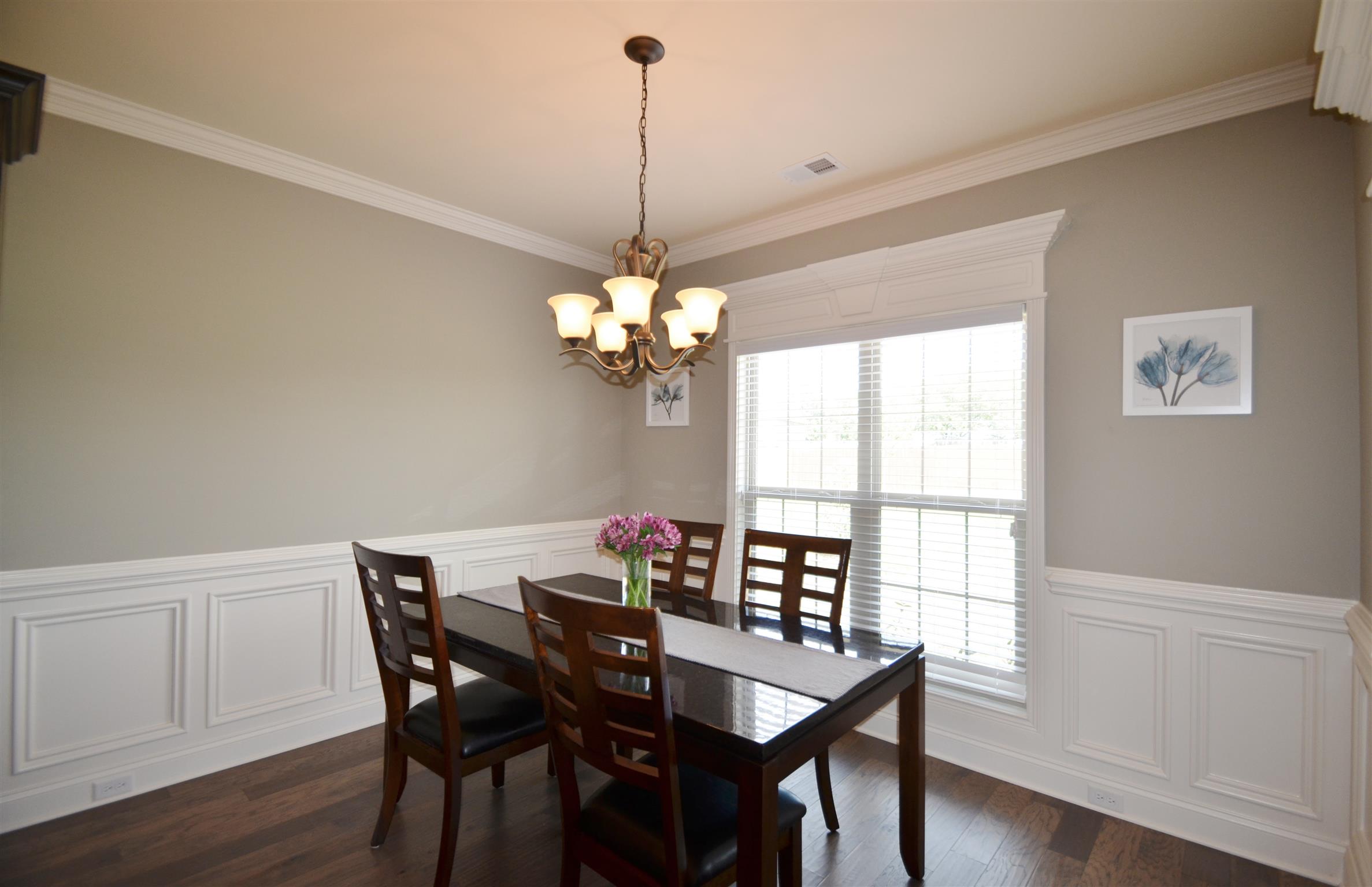 202 Monroe Way Lebanon, TN 37087 - Photo 4 of 26 Extensive trim package is found throughout and this room features wainscoting and window trim