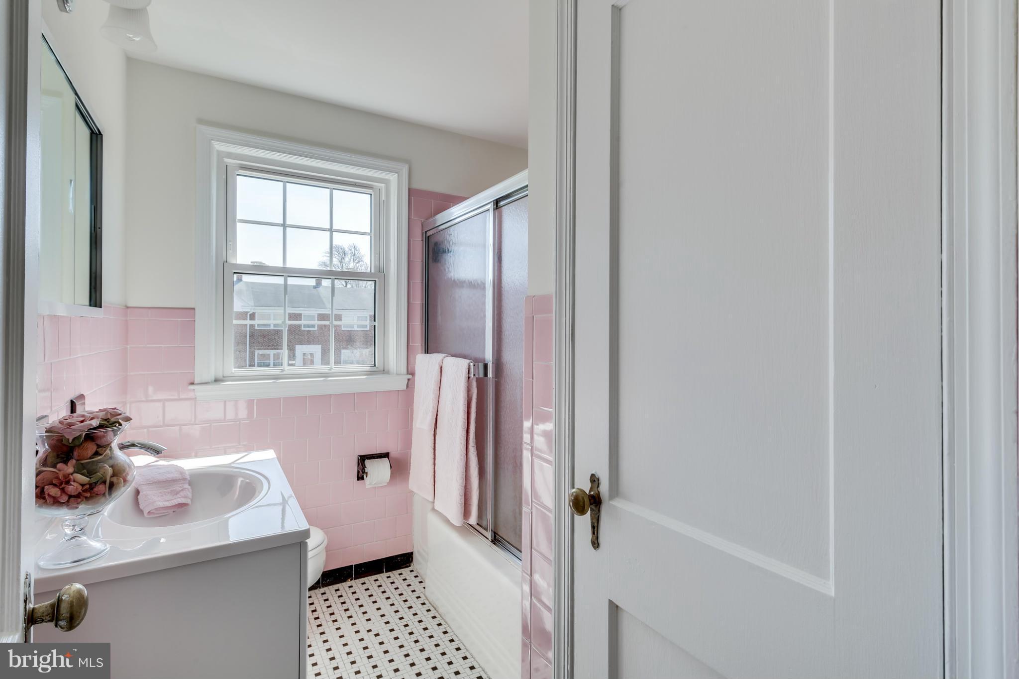 1512 Langford Road Baltimore, MD 21207 - Photo 17 of 30 a bathroom with a sink toilet and shower