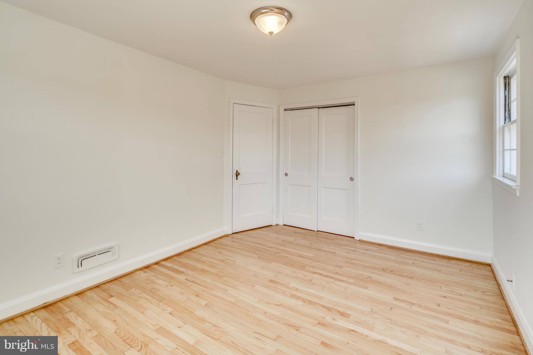 1512 Langford Road Baltimore, MD 21207 - Photo 19 of 30 a view of an empty room and window
