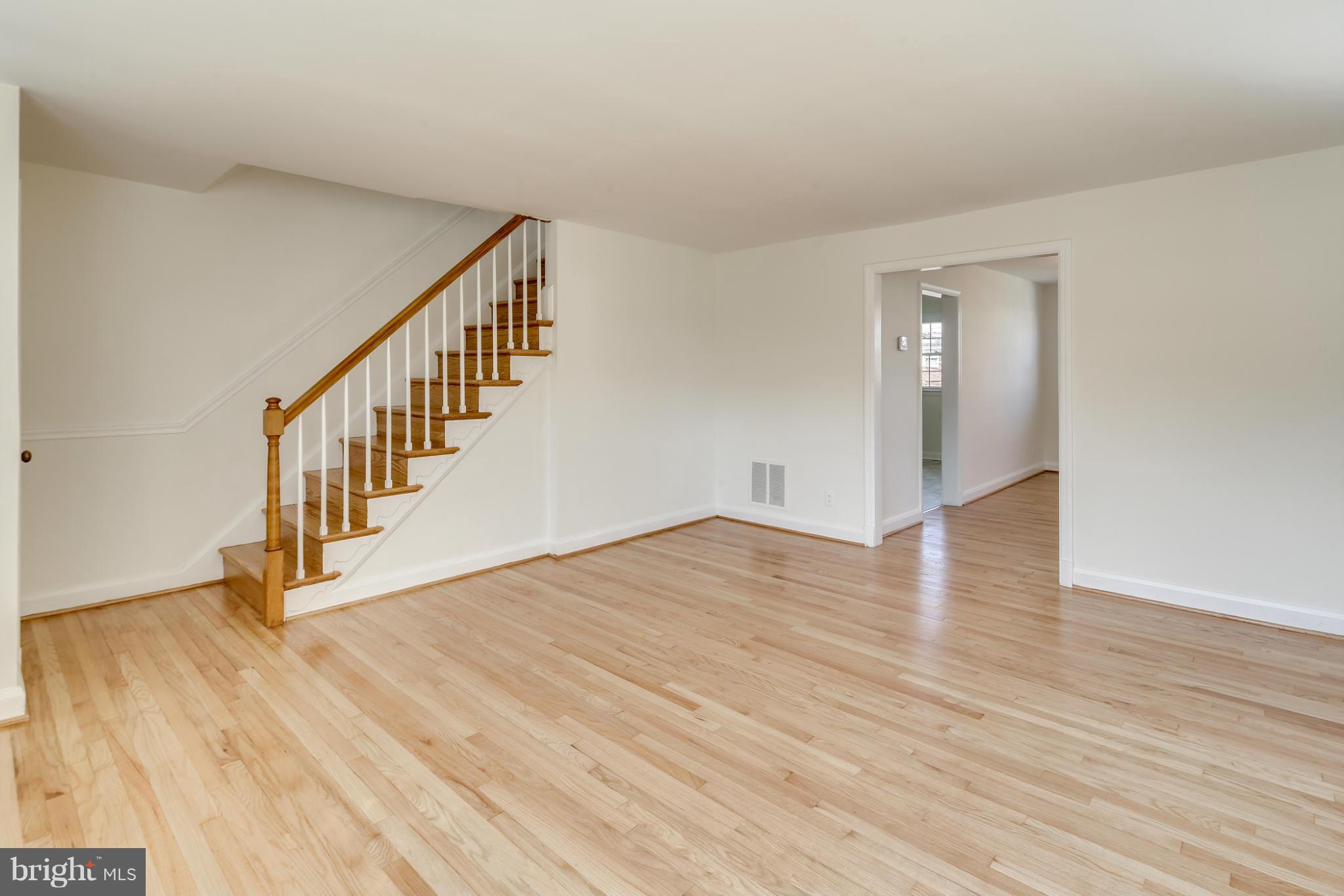 1512 Langford Road Baltimore, MD 21207 - Photo 3 of 30 a view of an entryway with wooden floor