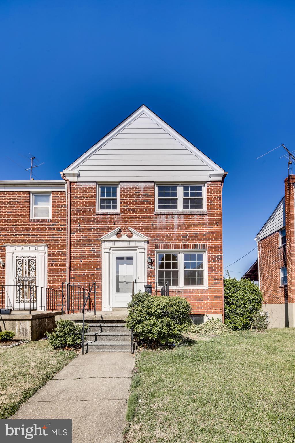 1512 Langford Road Baltimore, MD 21207 - Photo 28 of 30 a front view of a house with a yard