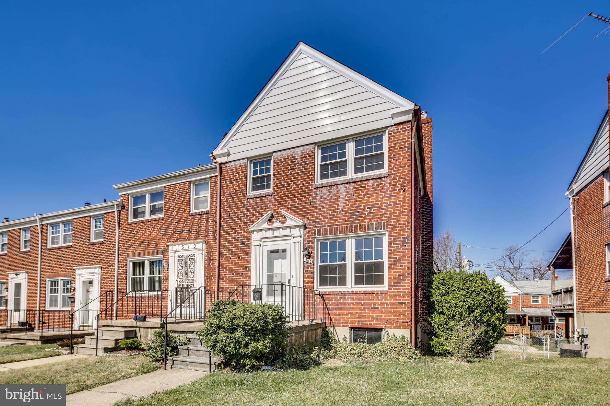 1512 Langford Road Baltimore, MD 21207 - Photo 29 of 30 a front view of a house with a yard