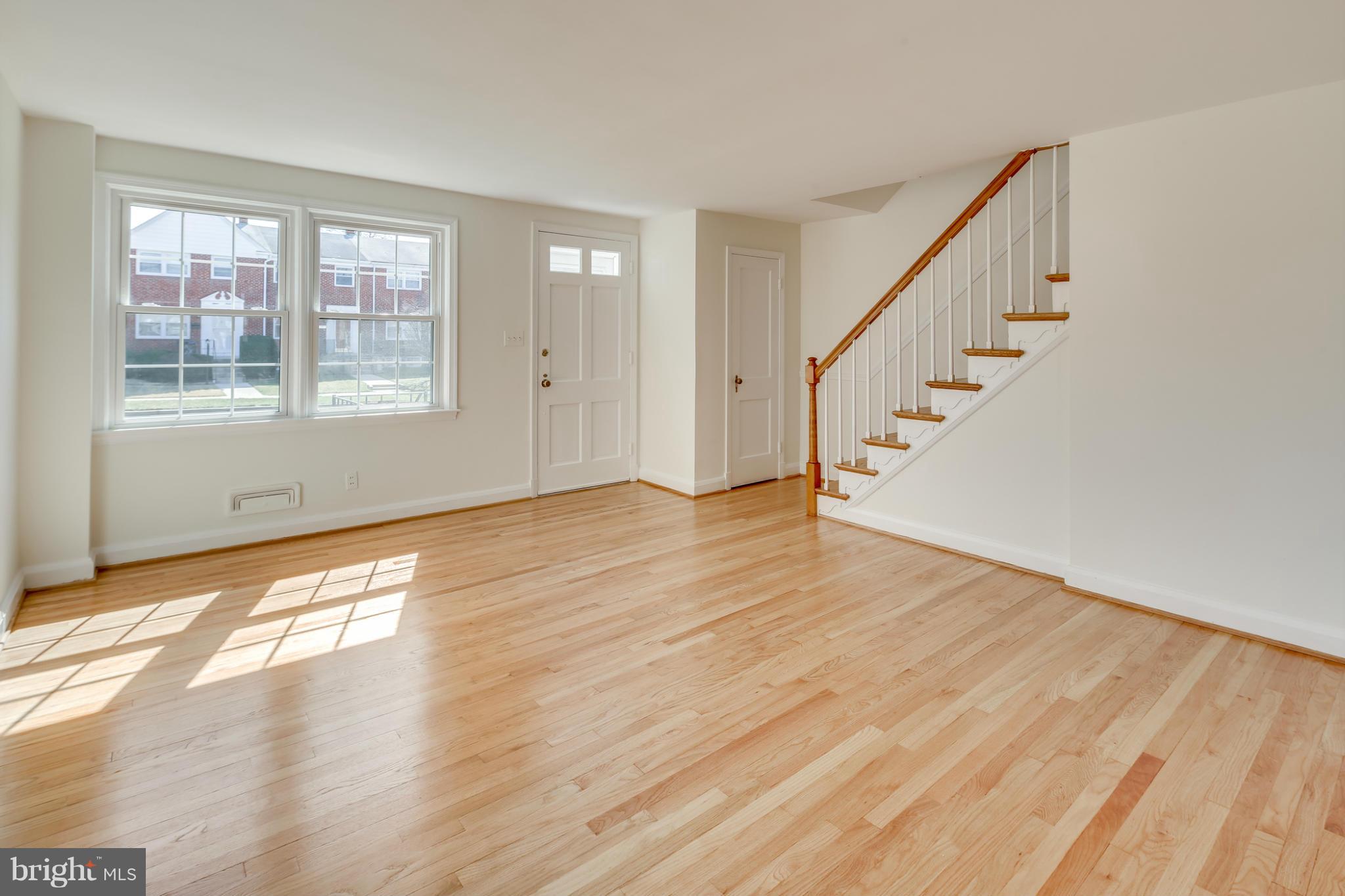 1512 Langford Road Baltimore, MD 21207 - Photo 4 of 30 a view of an entryway with wooden floor
