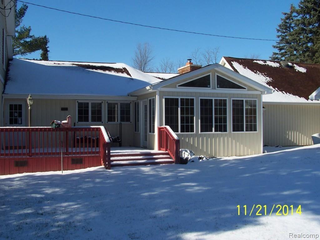 12920 Tophith Road Grass Lake, MI 49240 - Photo 18 of 22 DECK AND SUN ROOM