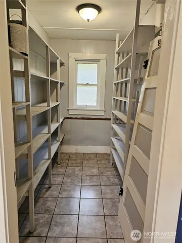 a view of empty room with empty racks