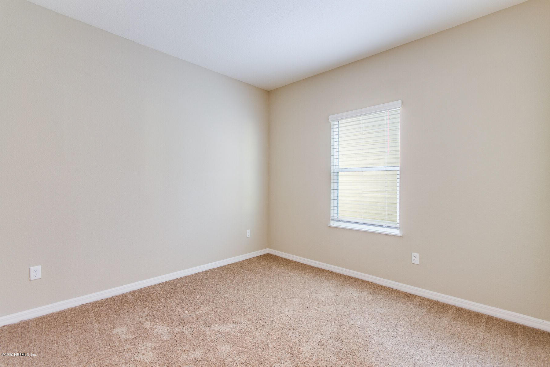 98 Tree Frog Way St. Augustine, FL 32095 - Photo 16 of 19 an empty room with a window