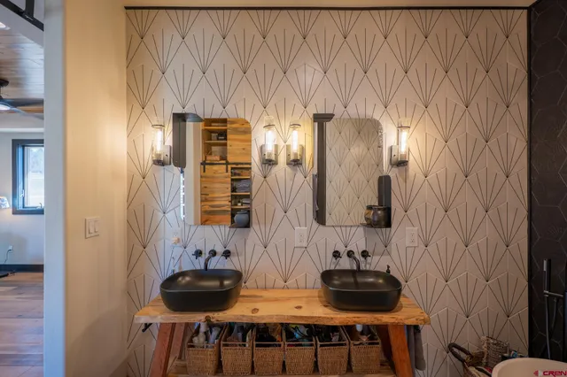 a view of dinning table and chairs in patio