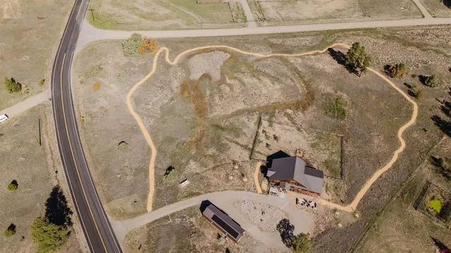 a room with furniture and a large window