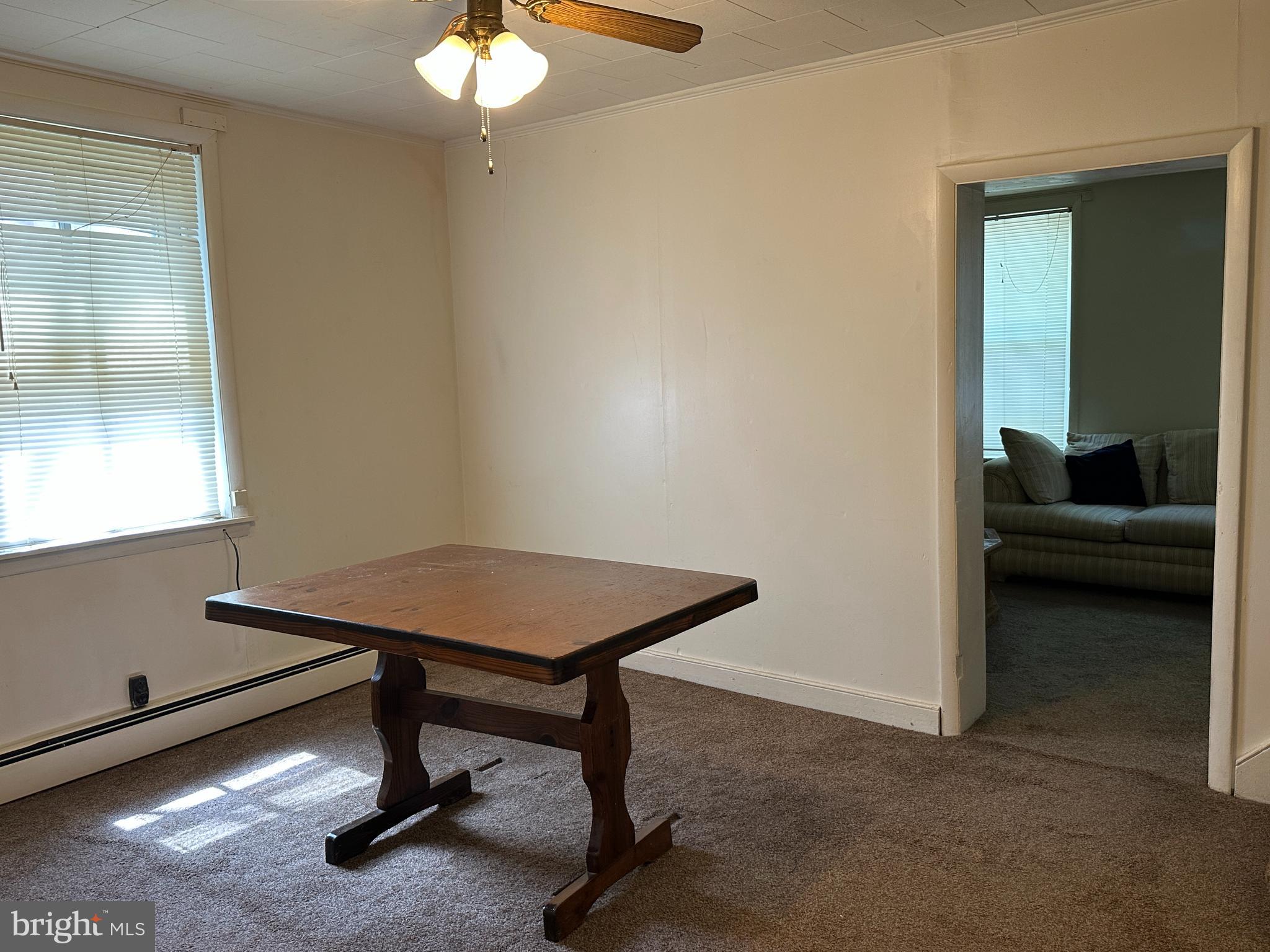 3670 Orrstown Road Orrstown, PA 17244 - Photo 2 of 8 a view of a workspace with furniture and a window