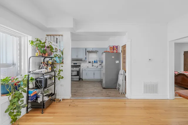 a bedroom with a bed and a desk