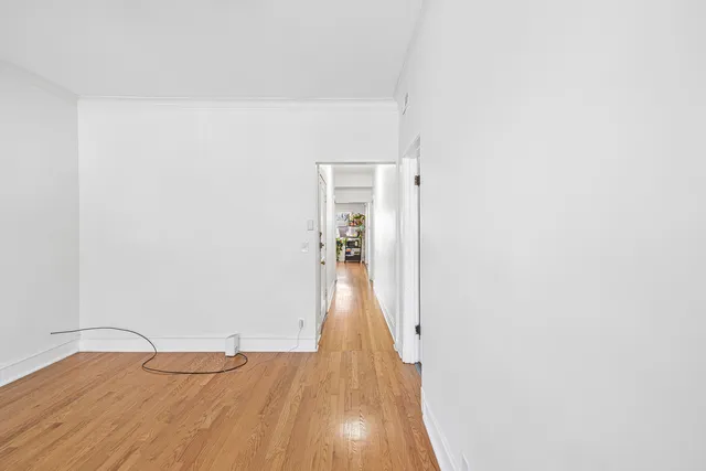 a kitchen with stainless steel appliances granite countertop a stove a refrigerator and a refrigerator