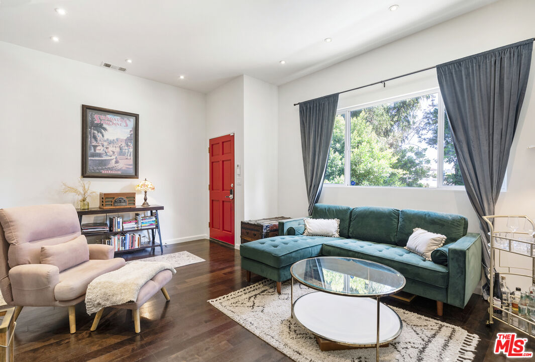 3960 Roderick Road Los Angeles, CA 90065 - Photo 4 of 24 a living room with furniture and a large window