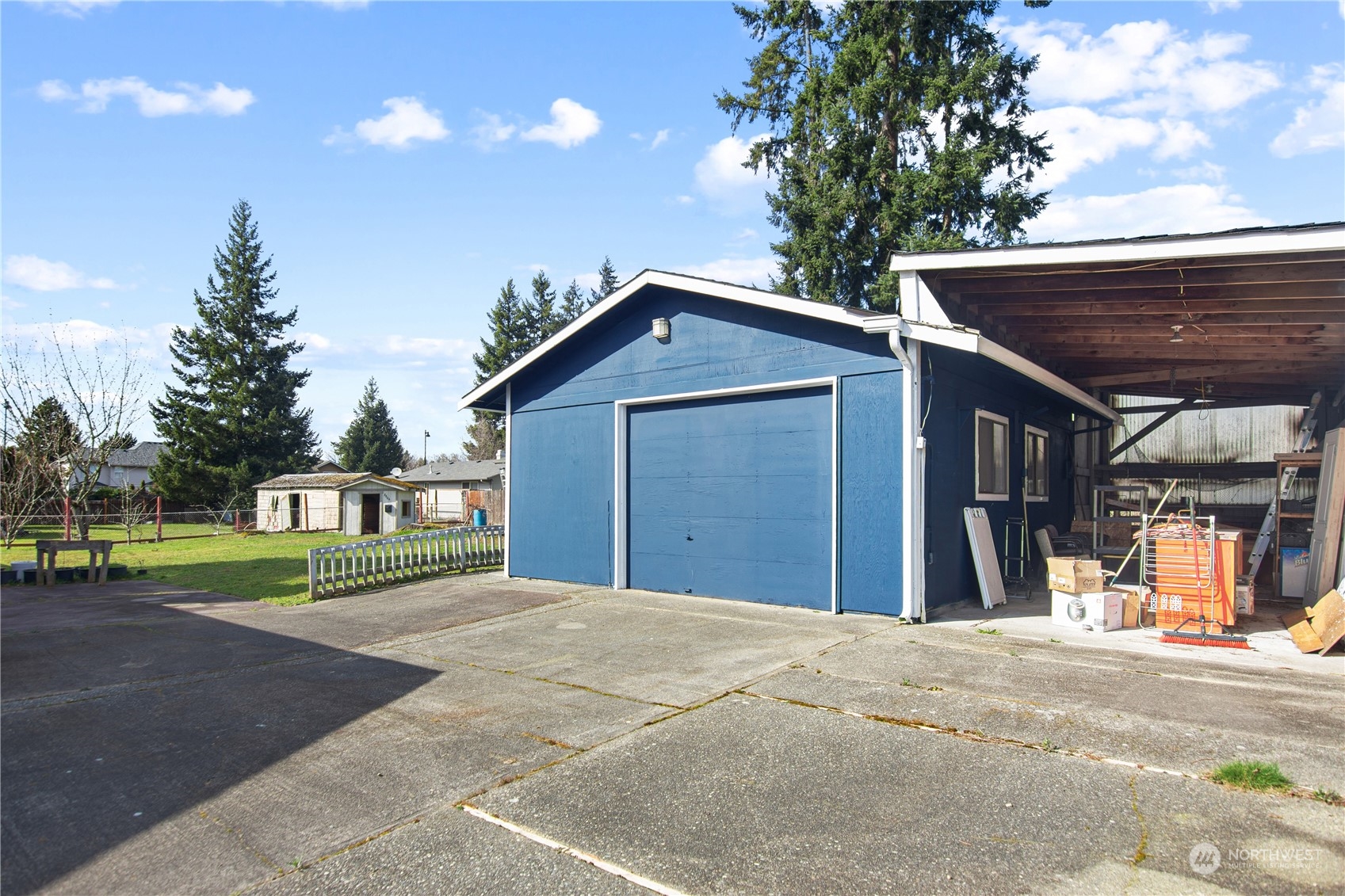 4706 Northeast 18th Street Renton, WA 98059 - Photo 23 of 26 a front view of a house with a yard and garage