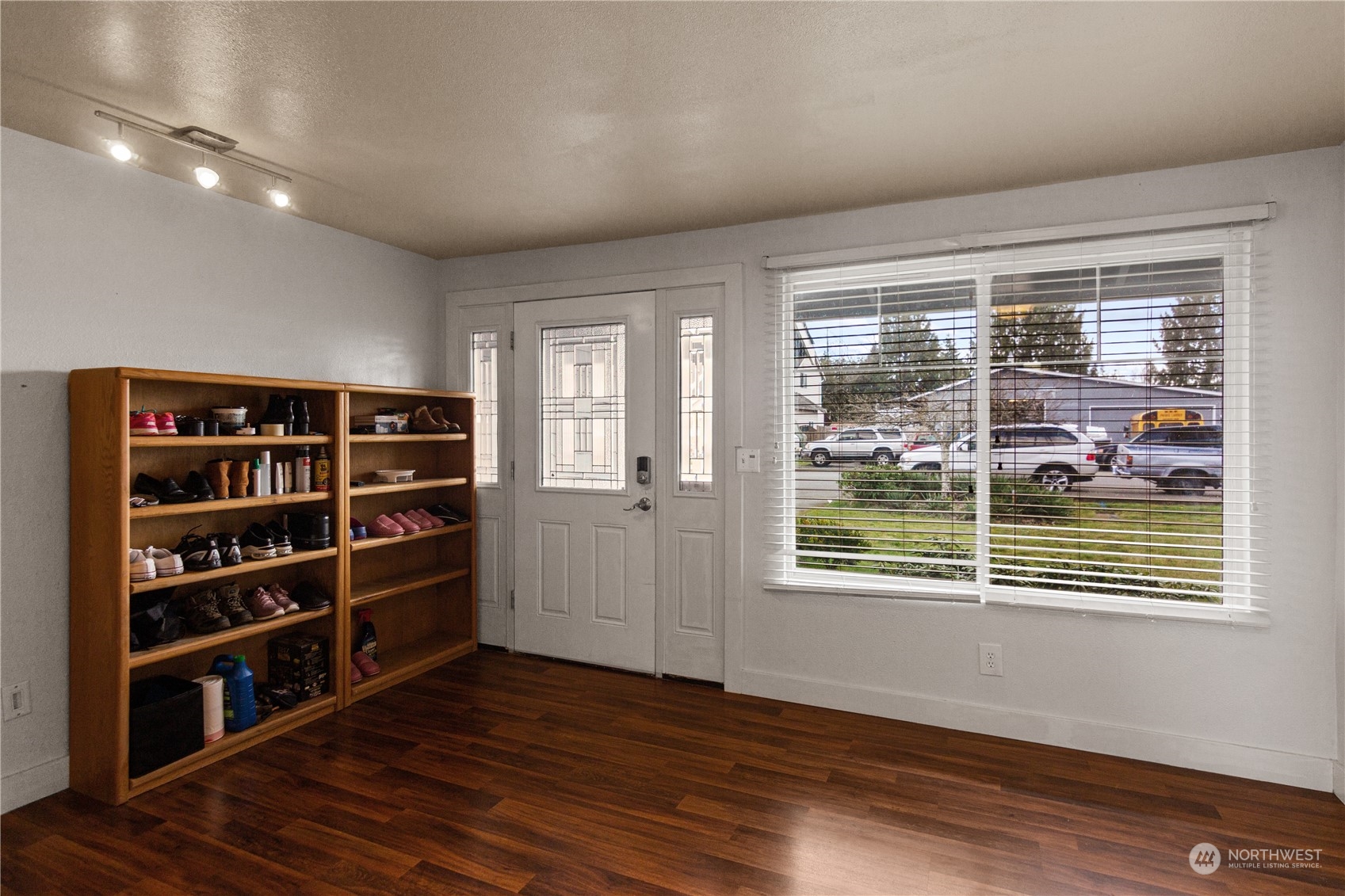 4706 Northeast 18th Street Renton, WA 98059 - Photo 5 of 26 a view of wooden floor and windows in a room