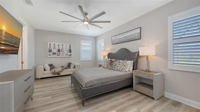 a bedroom with a bed and window