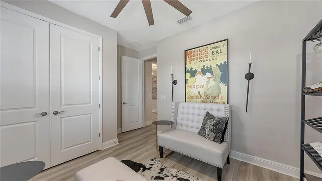 a view of a patio with a table chairs and a backyard