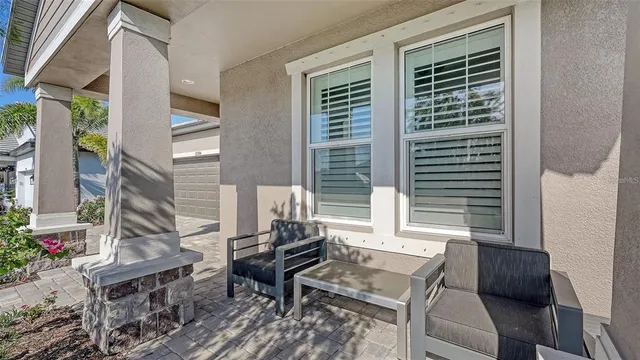 a view of room with furniture and a window