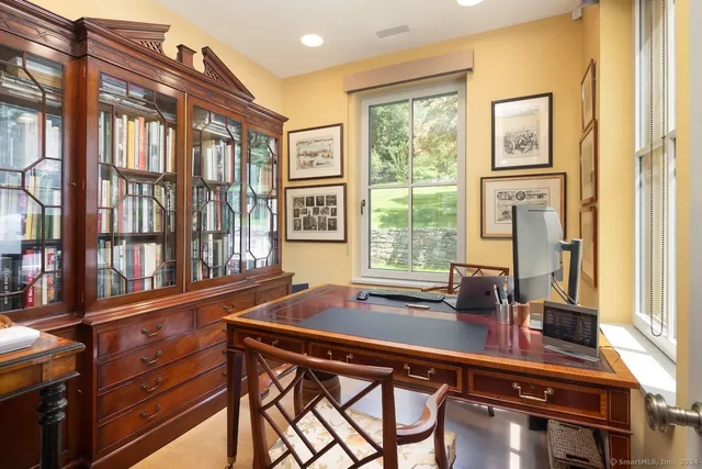 a view of a dining room with furniture window and outside view