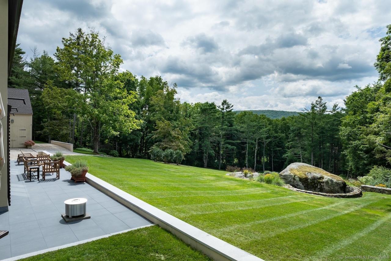 89 Under Mountain Road Canaan, CT 06031 - Photo 21 of 40 a view of a house with a yard