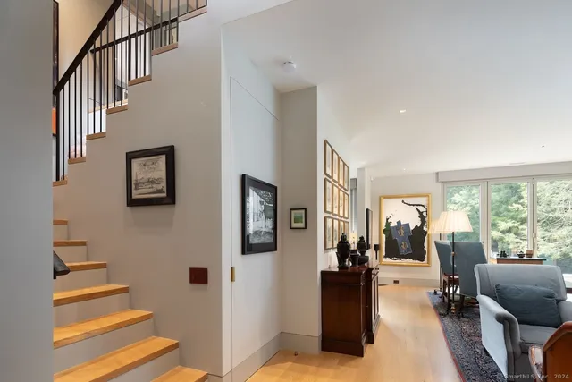 a view of a living room and workspace