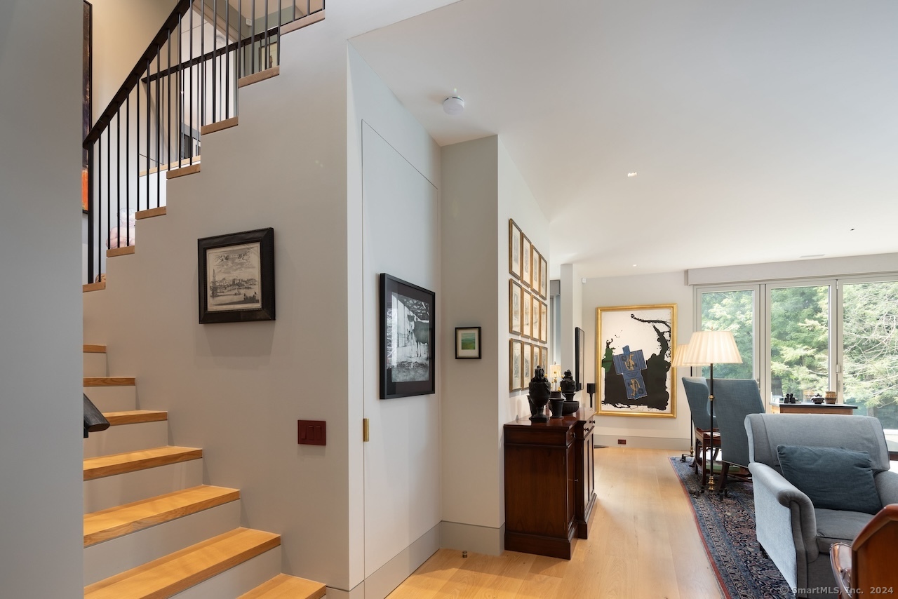 89 Under Mountain Road Canaan, CT 06031 - Photo 5 of 40 a view of a living room and workspace
