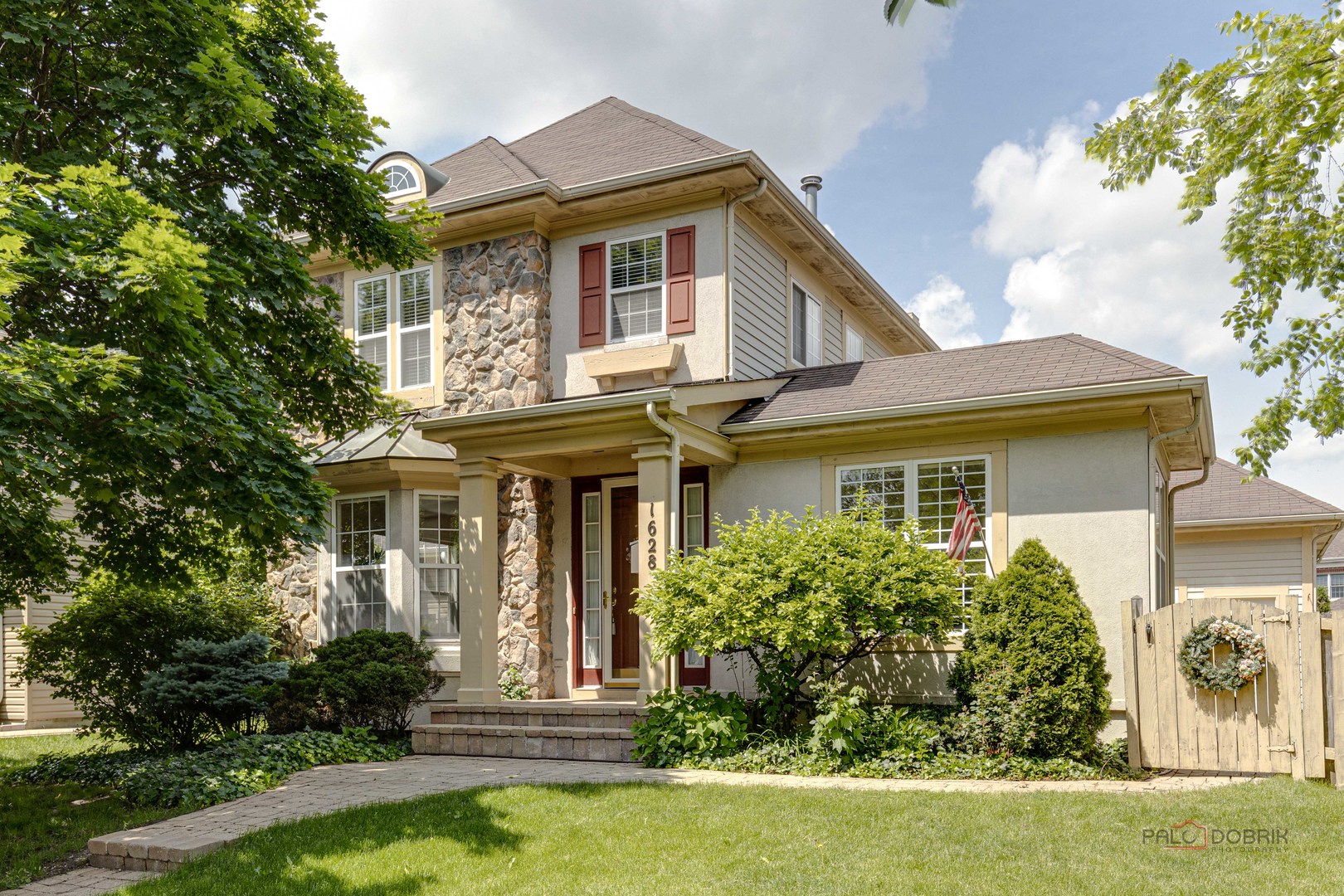 1628 Canfield Road Park Ridge, IL 60068 - Photo 1 of 29 a front view of a house with garden