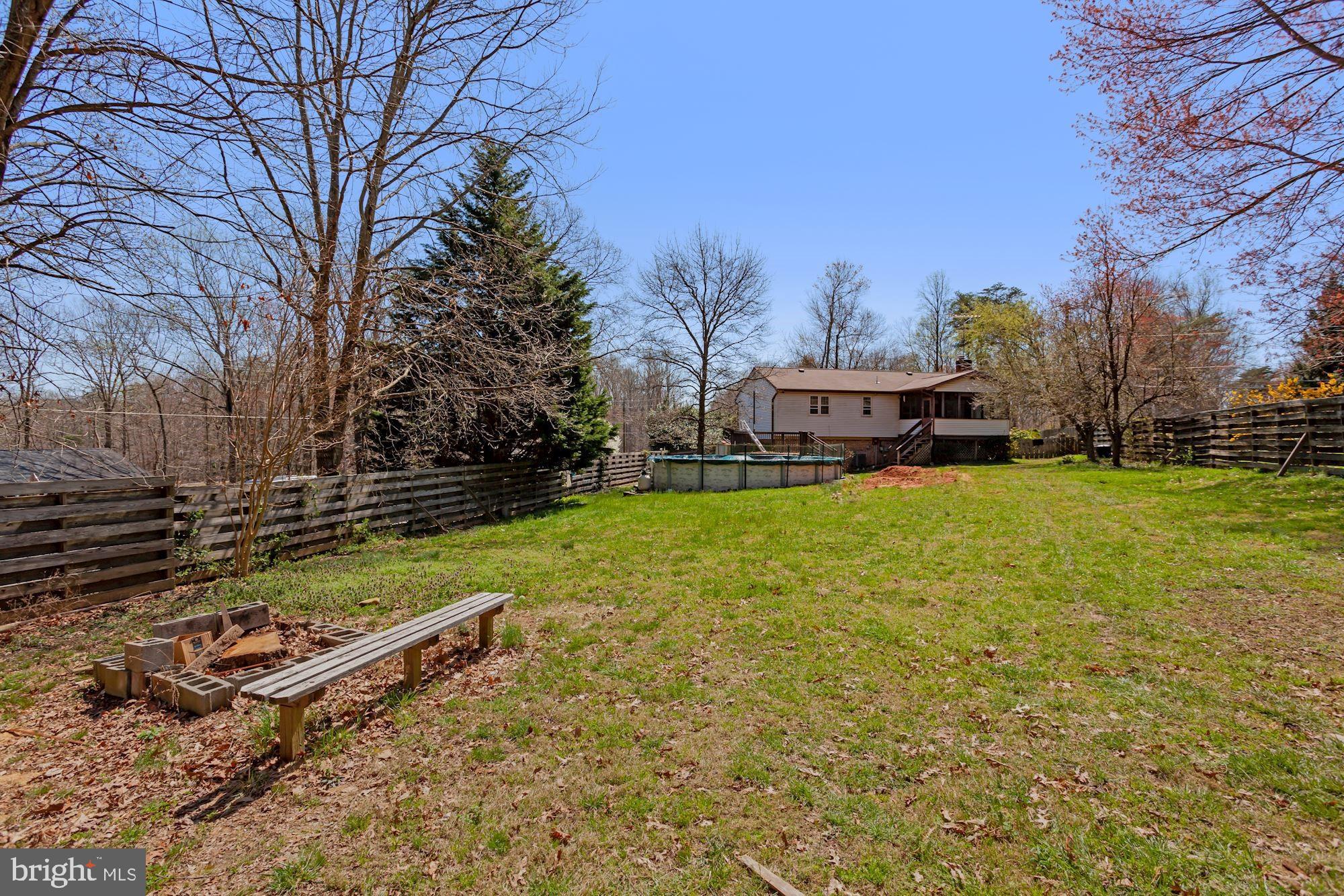 9090 Keyser Road Nokesville, VA 20181 - Photo 47 of 55 Firepit area to the rear of Backyard