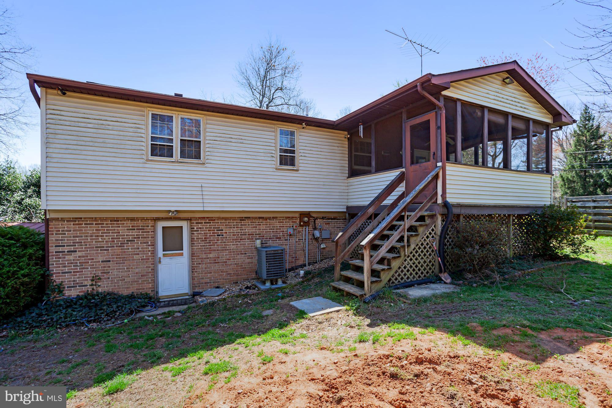 9090 Keyser Road Nokesville, VA 20181 - Photo 49 of 55 View of stairway off of Screened Porch to Backyard