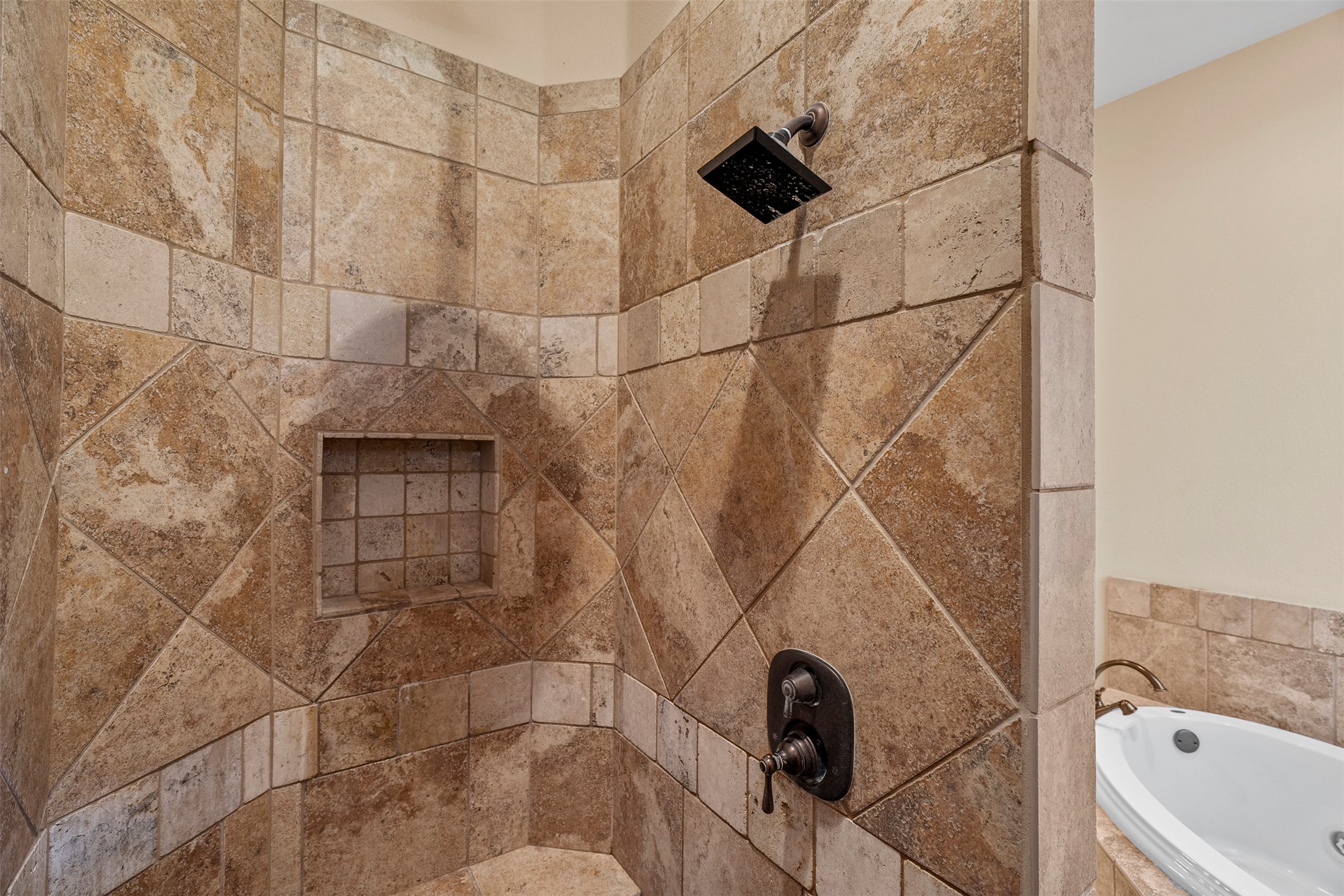 100 Portafino Lane Georgetown, TX 78633 - Photo 18 of 39 Bathroom view of a garden tub and a tile shower