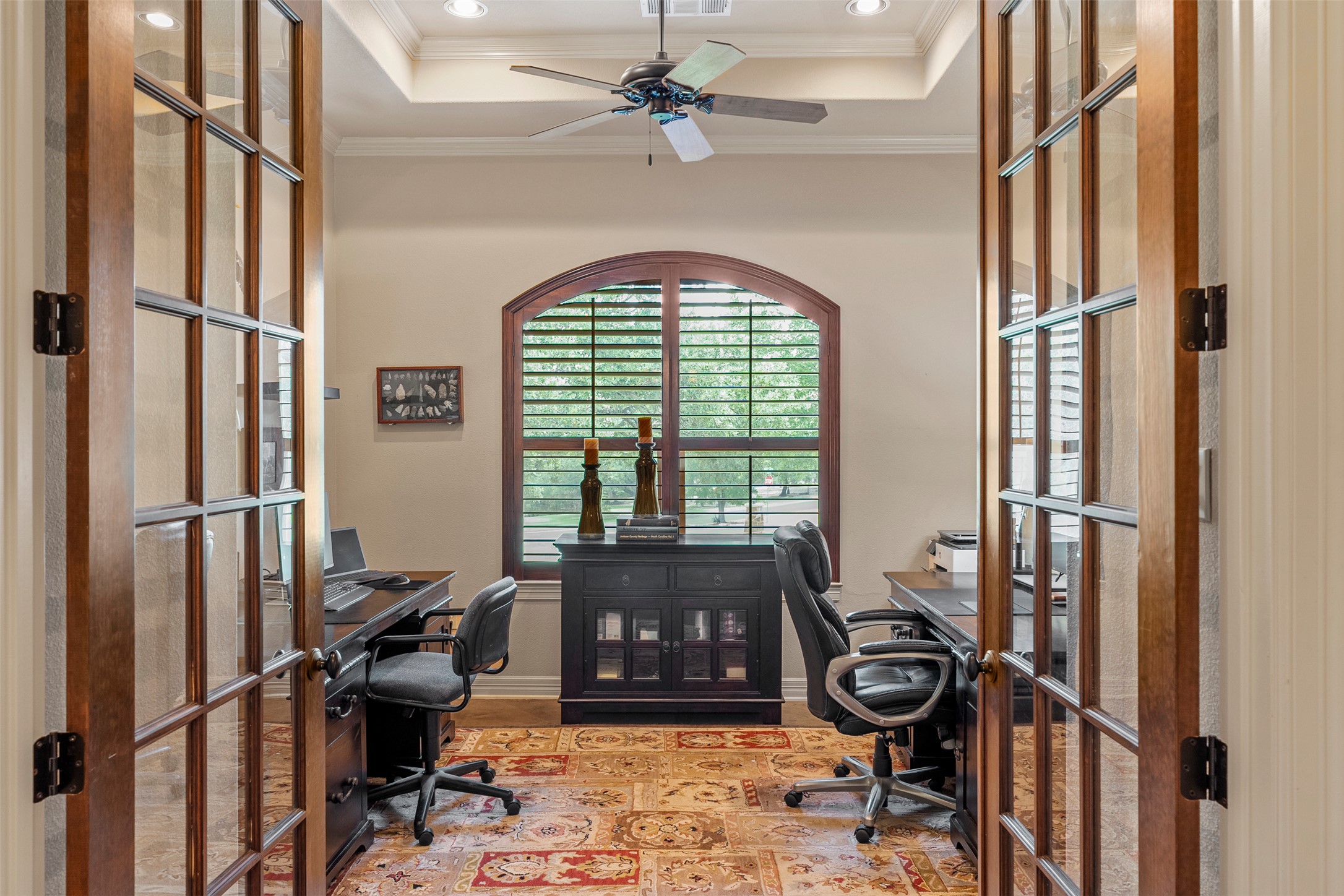 100 Portafino Lane Georgetown, TX 78633 - Photo 20 of 39 Office area featuring french doors, wood finished floors, ceiling fan, crown molding, and recessed lighting