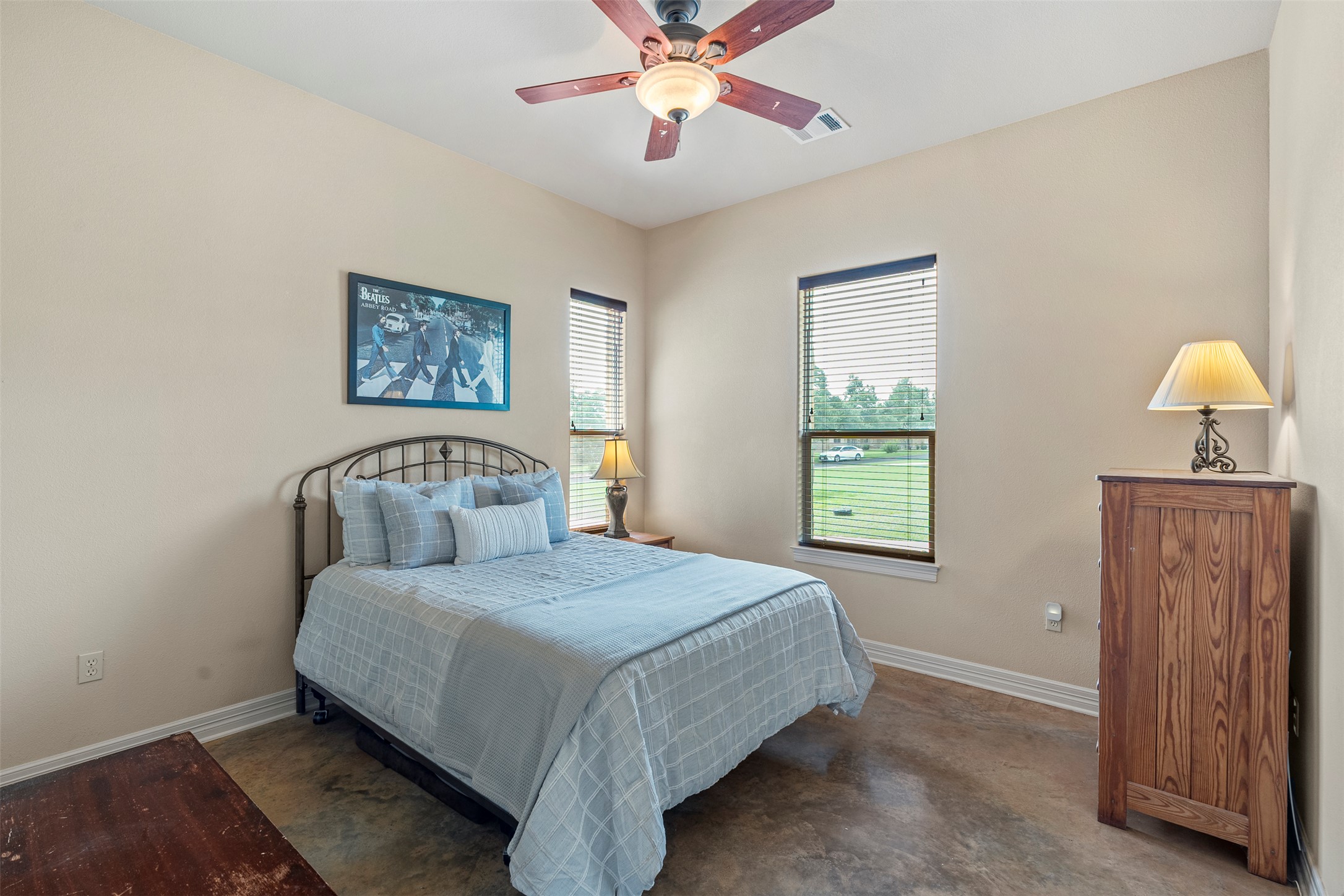 100 Portafino Lane Georgetown, TX 78633 - Photo 23 of 39 Bedroom with baseboards and a ceiling fan