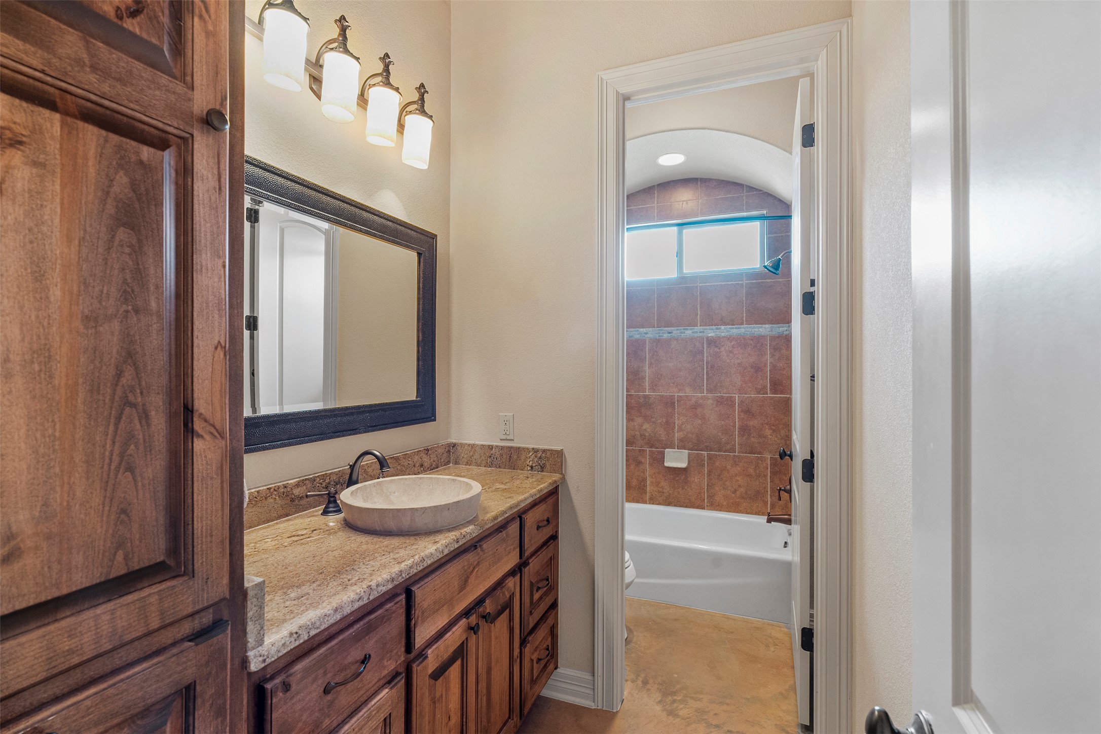 100 Portafino Lane Georgetown, TX 78633 - Photo 24 of 39 Full bath with vanity and washtub / shower combination