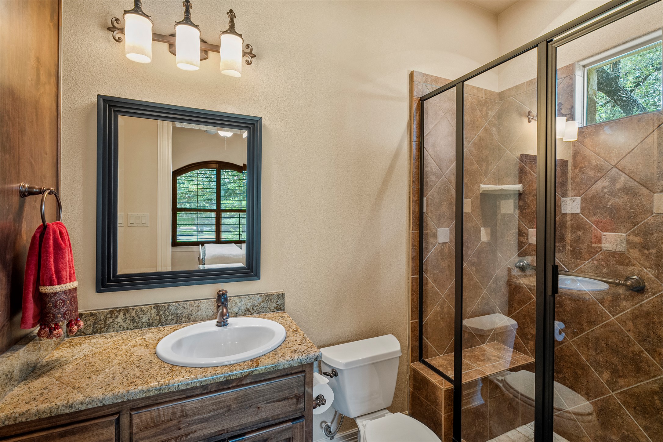 100 Portafino Lane Georgetown, TX 78633 - Photo 26 of 39 Bathroom featuring vanity and a stall shower