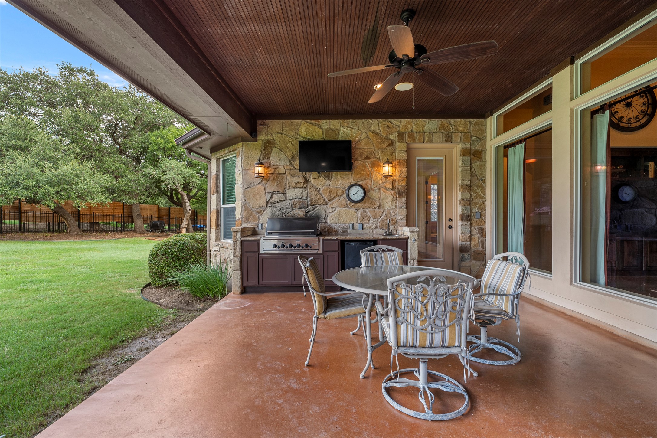 100 Portafino Lane Georgetown, TX 78633 - Photo 30 of 39 View of patio / terrace with a ceiling fan, an outdoor kitchen, and outdoor dining space