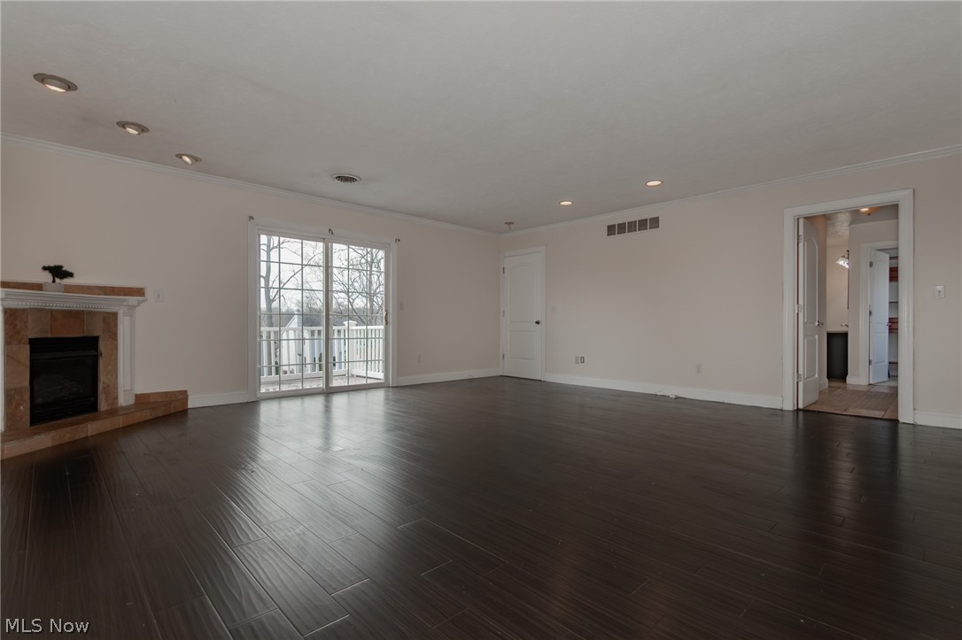 30200 Ridge Road Wickliffe, OH 44092 - Photo 25 of 43 Master Bedoom hardwood floors with fireplace