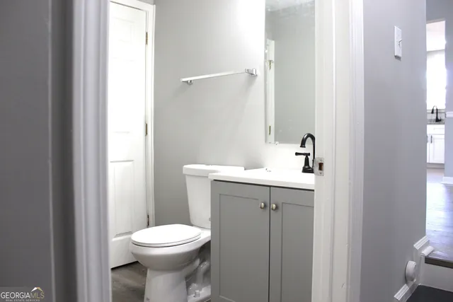 a bathroom with a sink and a toilet