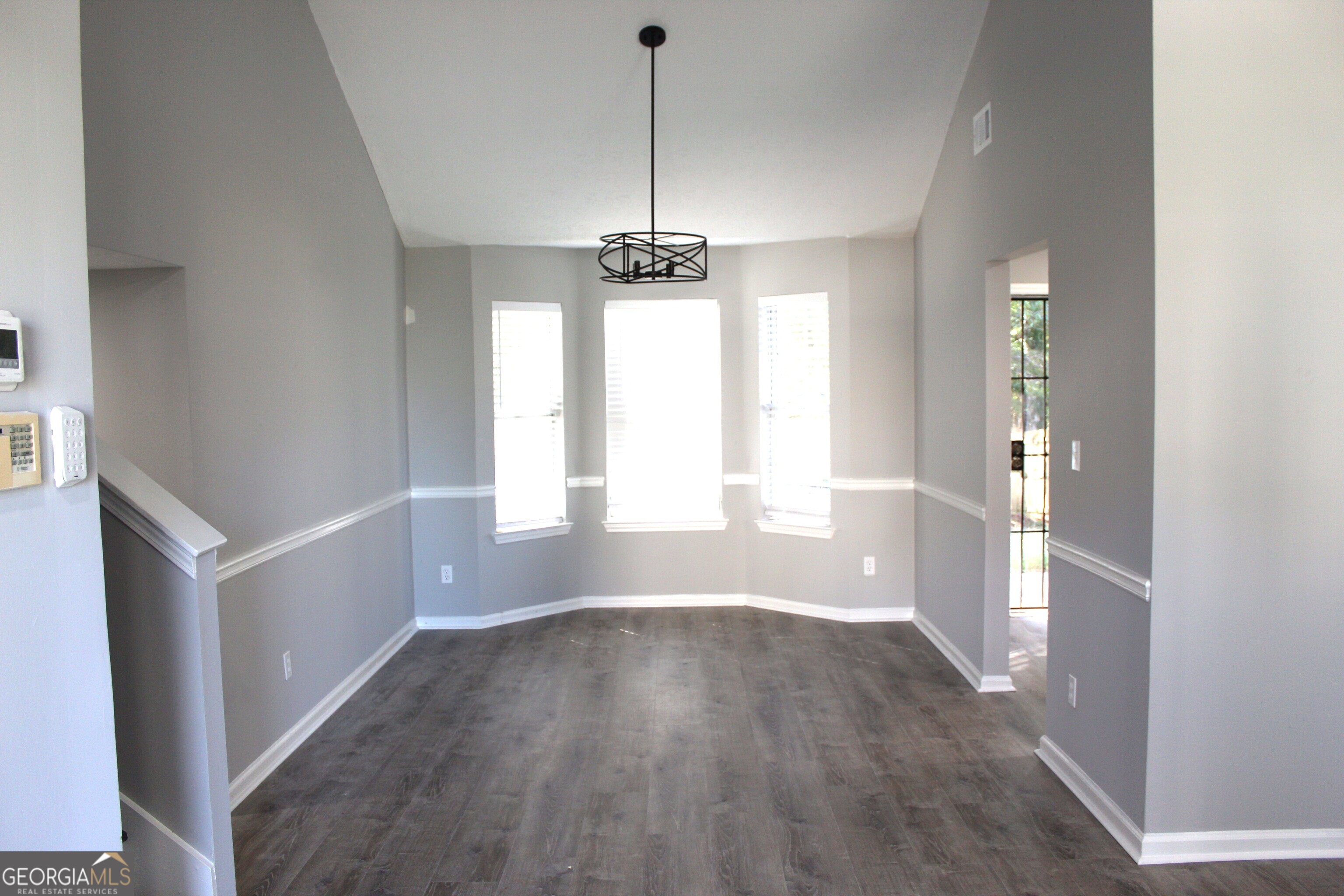 2640 Field Spring Drive Lithonia, GA 30058 - Photo 2 of 11 a view of a room with wooden floor and windows