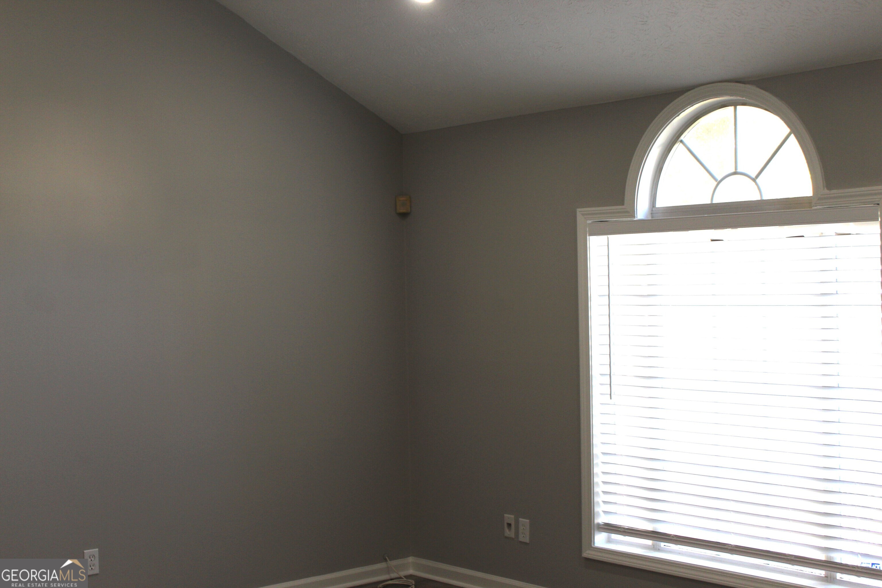 2640 Field Spring Drive Lithonia, GA 30058 - Photo 7 of 11 an empty room with a window